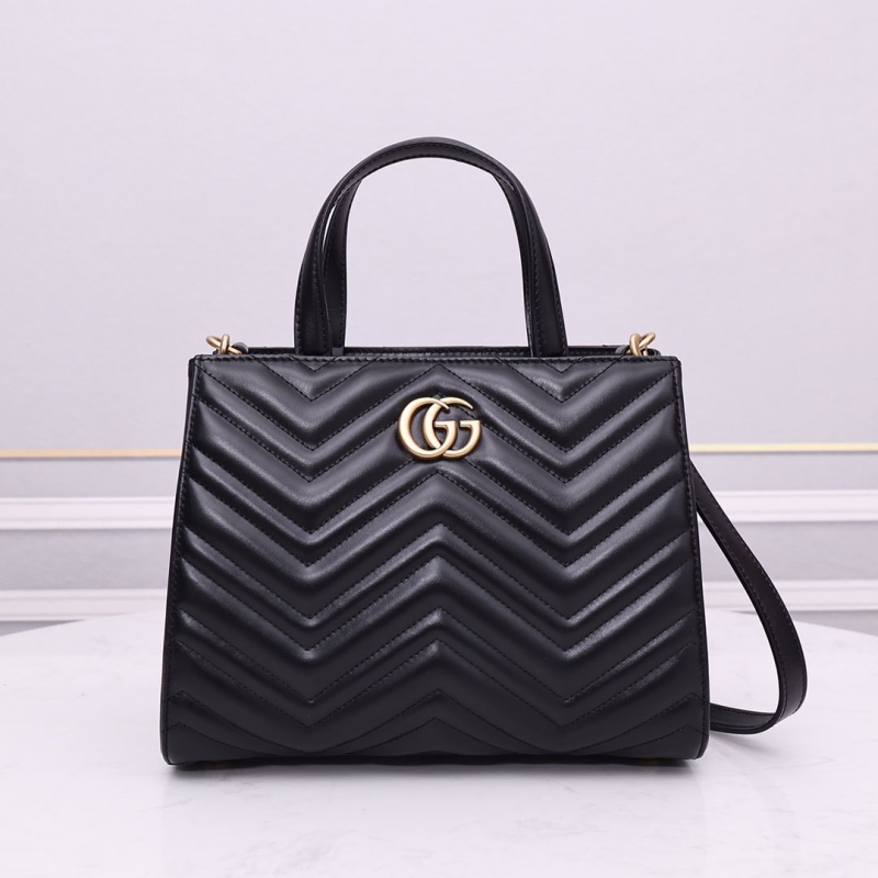G*u*i shopping bags